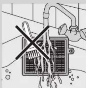 Diagram of a kitchen sink with pipes and a valve, showing no text or symbols.