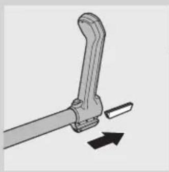Mechanical tool with a lever and directional arrow indicating motion.