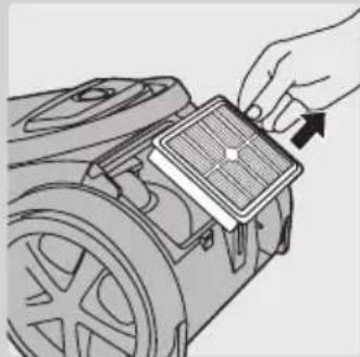 Illustration of a hand placing a component into a motor (no text or symbols visible)