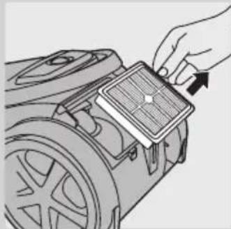 Illustration of a hand placing a component into a motor (no text or symbols visible)