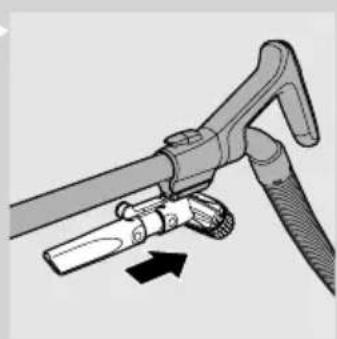 Diagram of a mechanical tool with a lever and handle, showing a directional arrow (no text or symbols present).