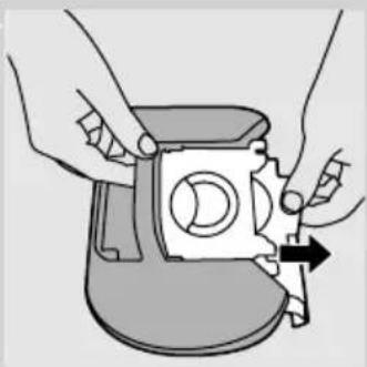 Illustration of hands assembling a mechanical component with a directional arrow (no text or symbols)