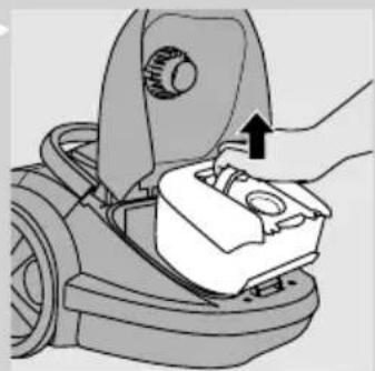 Mechanical component diagram showing a hand pressing a button onto a base (no text or symbols visible)