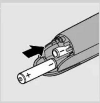 Diagram of a battery inside a cylindrical housing with an arrow indicating the direction (no text or symbols present).