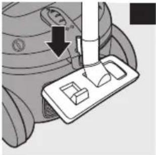 Mechanical component diagram showing a lever pressing into a tray with a handle (no text or symbols visible)