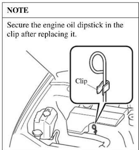 NOTE Secure the engine oil dipstick in the clip after replacing it.