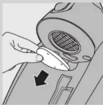 Illustration of a hand using a tool to adjust or install a component, with no visible text or symbols.