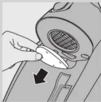 Illustration of a hand using a tool to adjust or install a mechanical component, with no visible text or symbols.