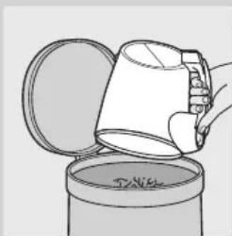 Illustration of a hand pouring liquid from a container into a cylindrical container (no text or symbols).
