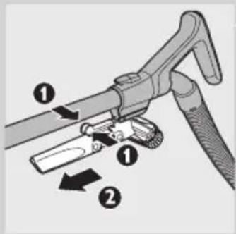 Diagram of a hairdryer tool with labeled parts and directional arrows indicating movement or assembly.