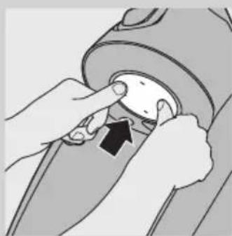 Illustration of hands adjusting a mechanical component with an arrow indicating rotation (no text or symbols present).