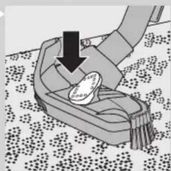 Illustration of a hand inserting a coin into a slot on a patterned floor.