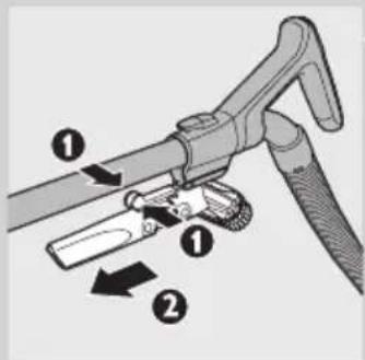Diagram of a hairdryer tool with labeled parts and directional arrows indicating movement or assembly.