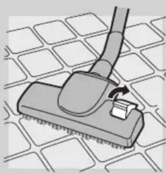 Diagram of a cleaning tool applying material to a tiled floor (no text or symbols).