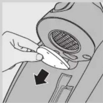 Illustration of a hand using a tool to adjust or install a component, with no visible text or symbols.