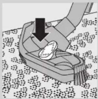 Illustration of a hand pressing down on a small object with a coin, placed on a patterned floor.
