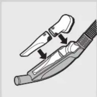 Illustration of a hairdryer tool with two clips and a handle (no text or symbols)