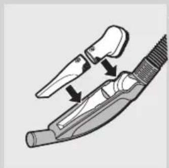 Diagram of a medical or surgical tool with arrows indicating movement or force (no text or symbols).
