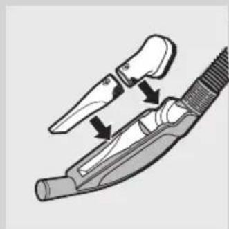 Diagram of a medical or surgical tool with arrows indicating movement or force (no text or symbols present).