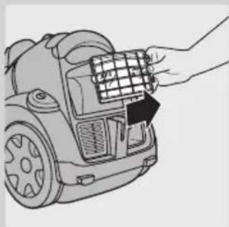 Line drawing of a hand inserting a grid into a device component (no text or symbols).