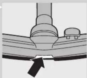 Diagram of a mechanical component with a downward arrow indicating force or direction (no text or symbols)