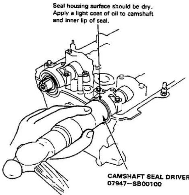 Seal housing surface should be dry. Apply a light coat of oil to camshaft and inner lip of seal. CAMSHAFT SEAL DRIVER 07947—SB00100