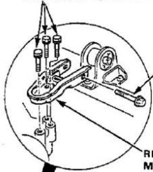 Technical diagram of a mechanical assembly with labeled parts and directional arrows indicating motion or force vectors.