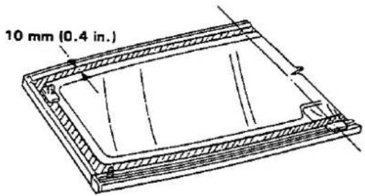 10 mm (0.4 in.)