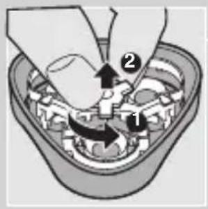 Diagram showing mechanical assembly with labeled parts and directional arrows, likely illustrating a gear or mechanism process.
