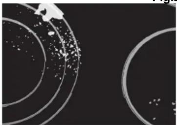 Abstract circular patterns with scattered dots and a small figure, no text or symbols present.