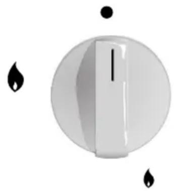 Close-up of a white circular knob with black droplets and a vertical slot, no text or symbols visible.