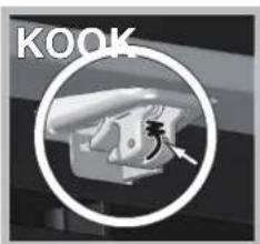 Close-up of a hand holding a small object with an arrow pointing to it, enclosed in a circular frame (no text or symbols)