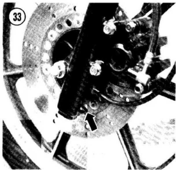 Close-up of a mechanical assembly with visible components and mounting holes (no text or symbols)