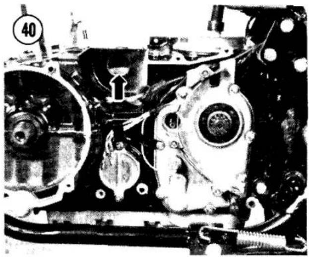 Close-up of an internal mechanical assembly with visible gears and springs (no text or symbols)