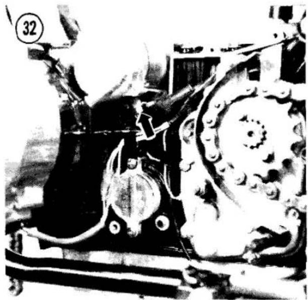 Black-and-white photo of a mechanical assembly with gears and components (no visible text or symbols)