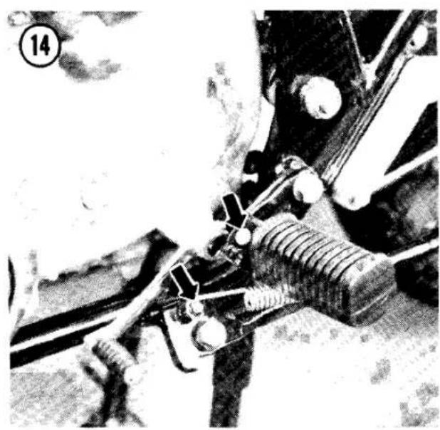 Mechanical assembly diagram showing components like springs, bolts, and a motor (no visible text or labels)