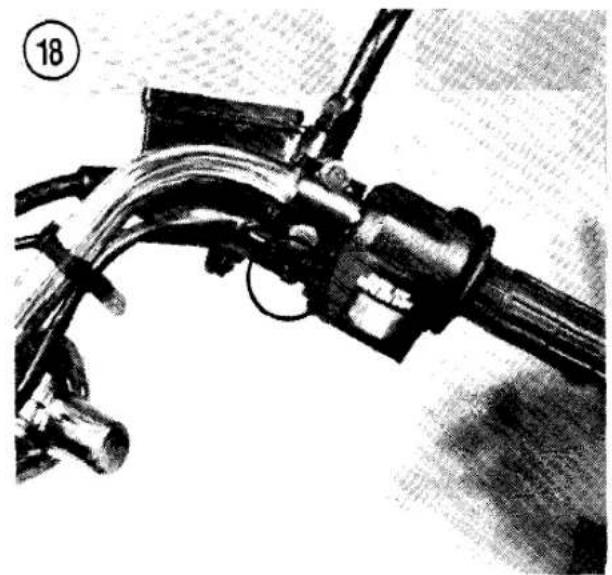 Close-up of a bicycle's wheel and suspension system (no visible text or symbols)