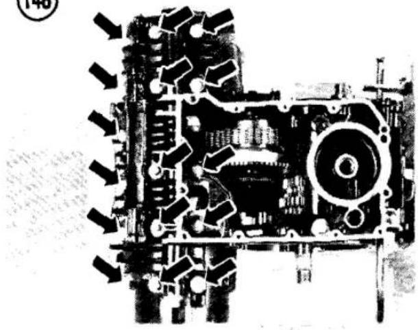 Cross-sectional view of a mechanical assembly with gears and housing (no visible text or symbols)