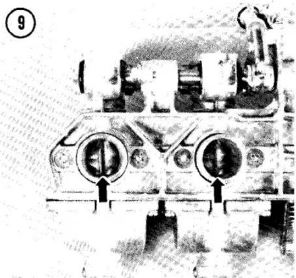 Front view of a military tank with visible engine and valve components (no text or symbols)