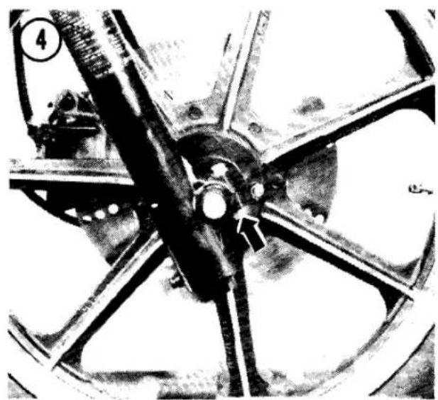 Close-up of a mechanical assembly with visible gears and shafts (no text or symbols)