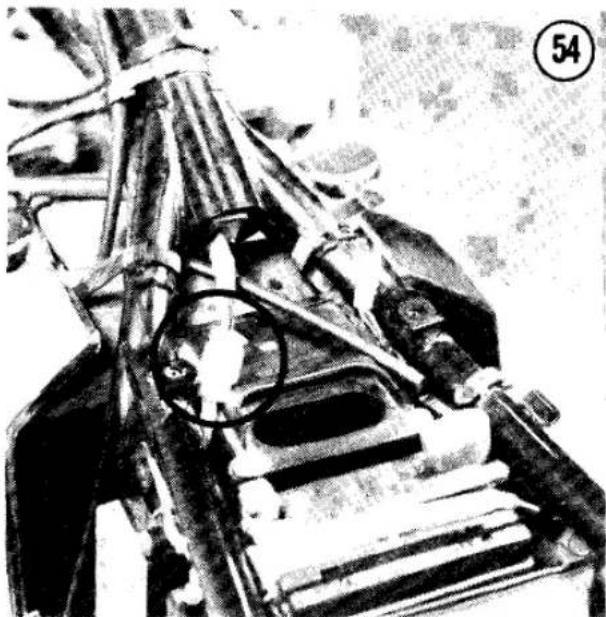 Close-up of a mechanical device with visible gears and shafts, no text or symbols present
