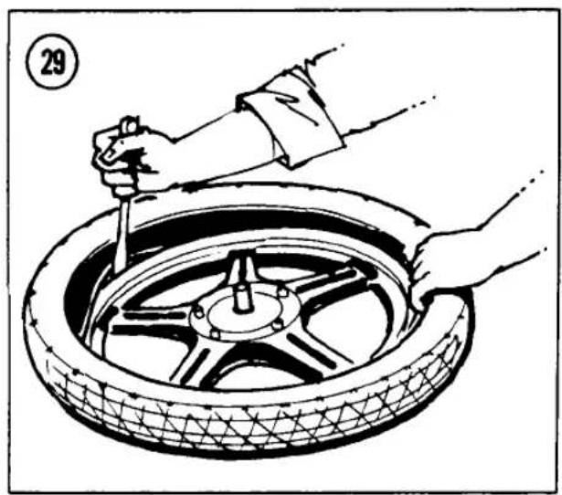 Illustration of hands using a tool to lift a tire, no text or symbols present