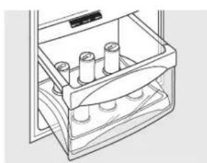 Line drawing of a mechanical device with cylindrical components and a tray (no text or symbols)