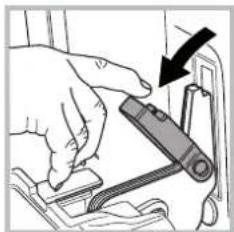 Hand inserting a device into a device component, showing a black arrow indicating the process (no text or symbols present)