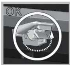 Circular icon showing a mechanical device inside a frame, with 'OK' text in the corner (no readable symbols or text)