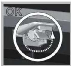 Close-up of a hand holding a device with a circular frame and dotted line, no visible text or symbols