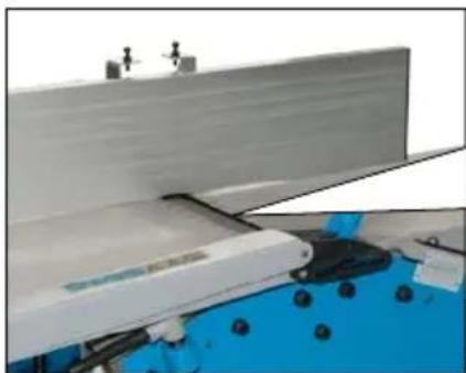 Industrial machine with blue base and mechanical components (no visible text or symbols)