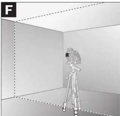 Interior view of a room with a camera on a tripod, no visible text or symbols