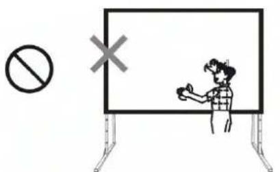 Safety warning sign with prohibition symbol and cross mark, showing a person giving a thumbs-up in front of a whiteboard