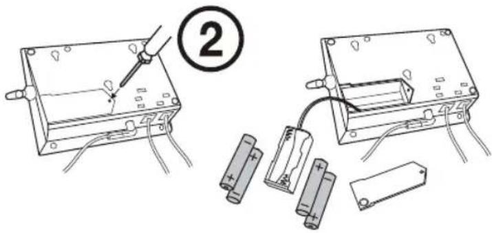 Diagram showing two electrical components with a tool, including battery and battery cells, labeled with number 2.